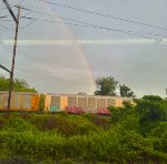 CSX M218 passing us with a rainbow.